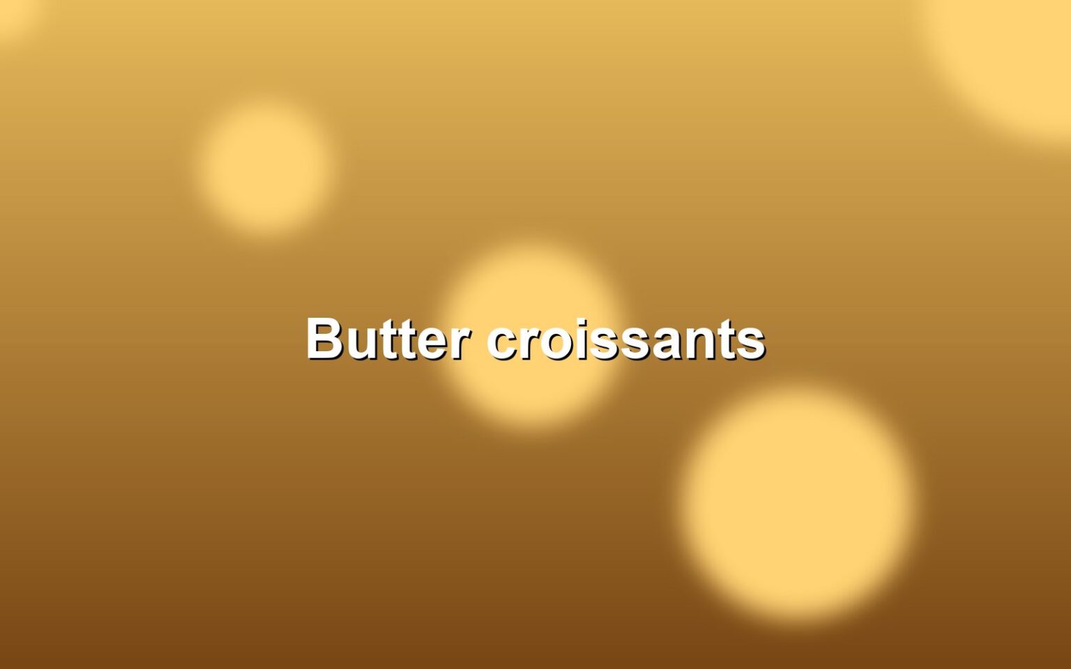 A tray of golden butter croissants