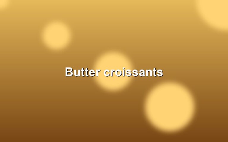 A tray of golden butter croissants